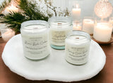 3 candles, wood wick candles with more candles in the background