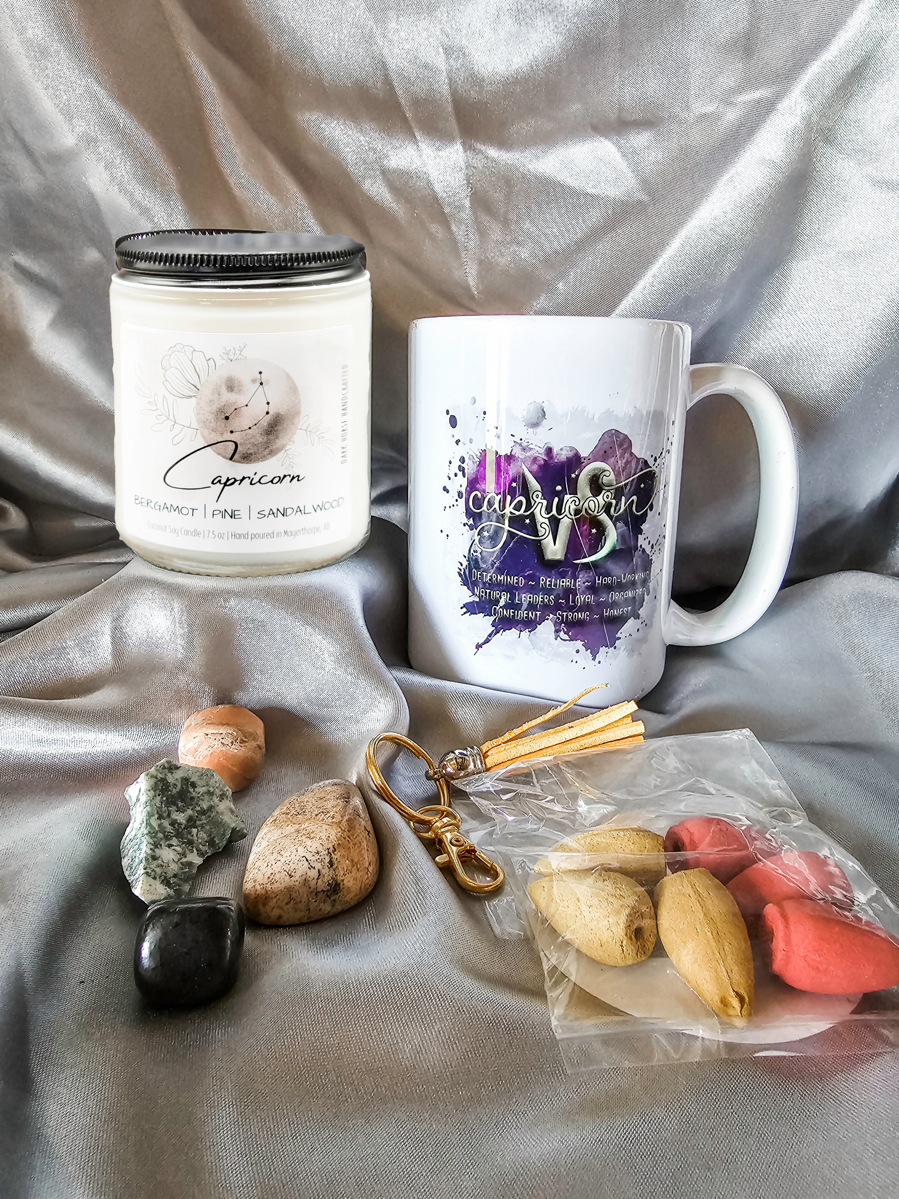 Capricorn zodiac candle gift box with mug, tumbled stones and incense cones.