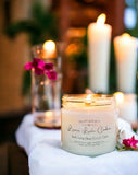 Luau Lush cake eco-friendly candle lit, with flowers
