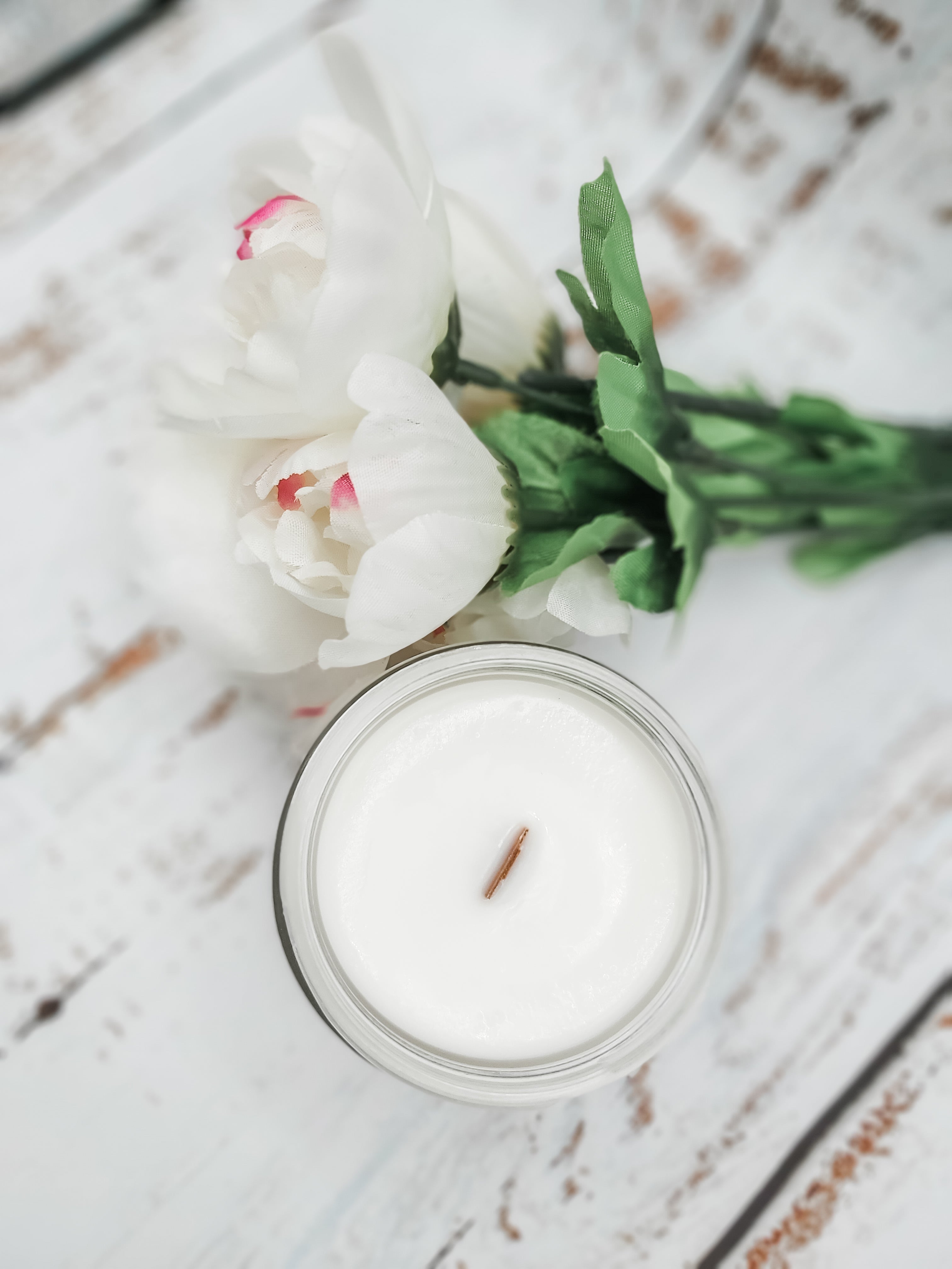 Pink Peony scented coconut soy wax candle with wood wick.