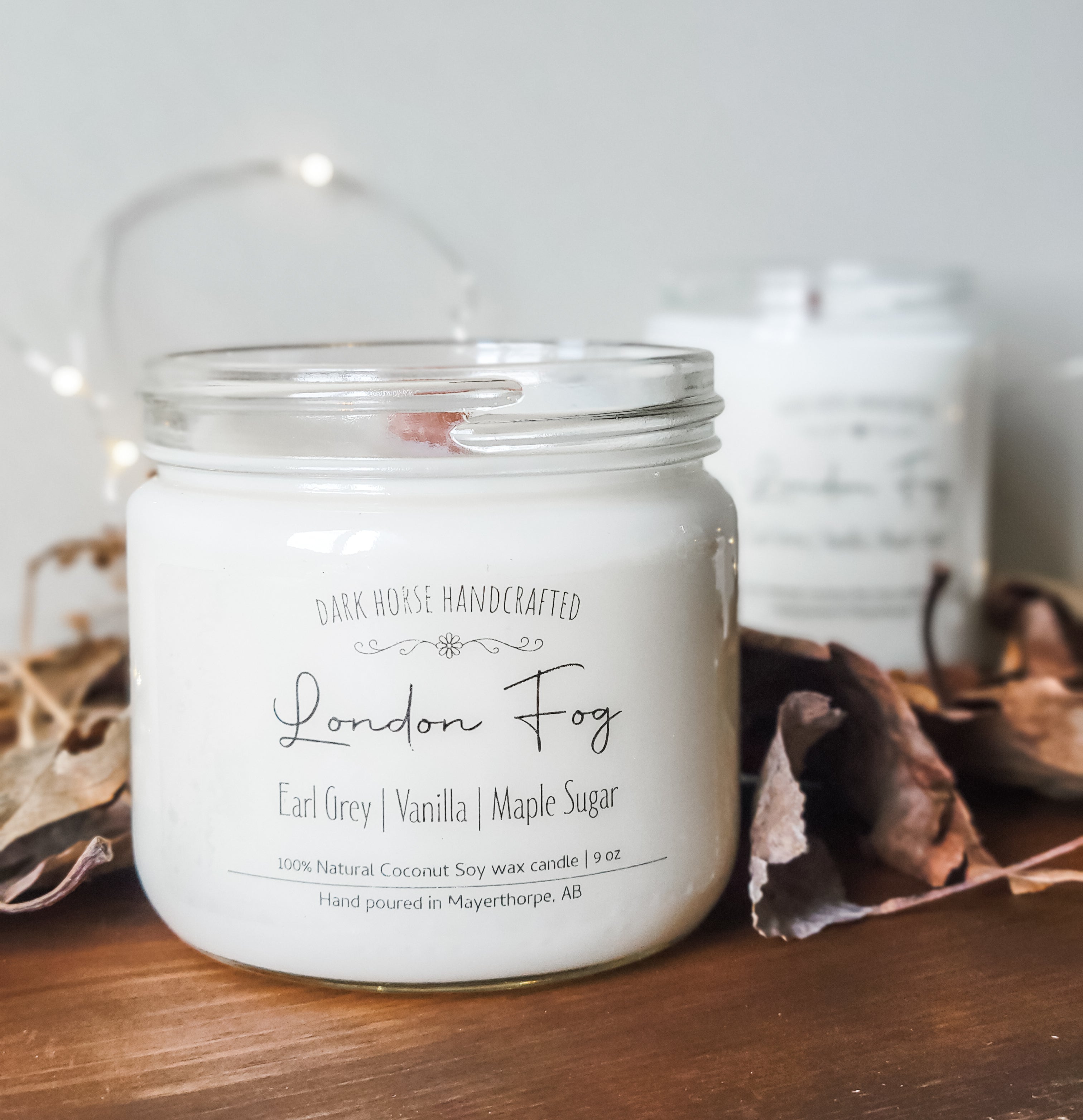 London Fog scented coconut soy candle with wood wick. Scent notes are Earl Grey, Vanilla & Maple Sugar