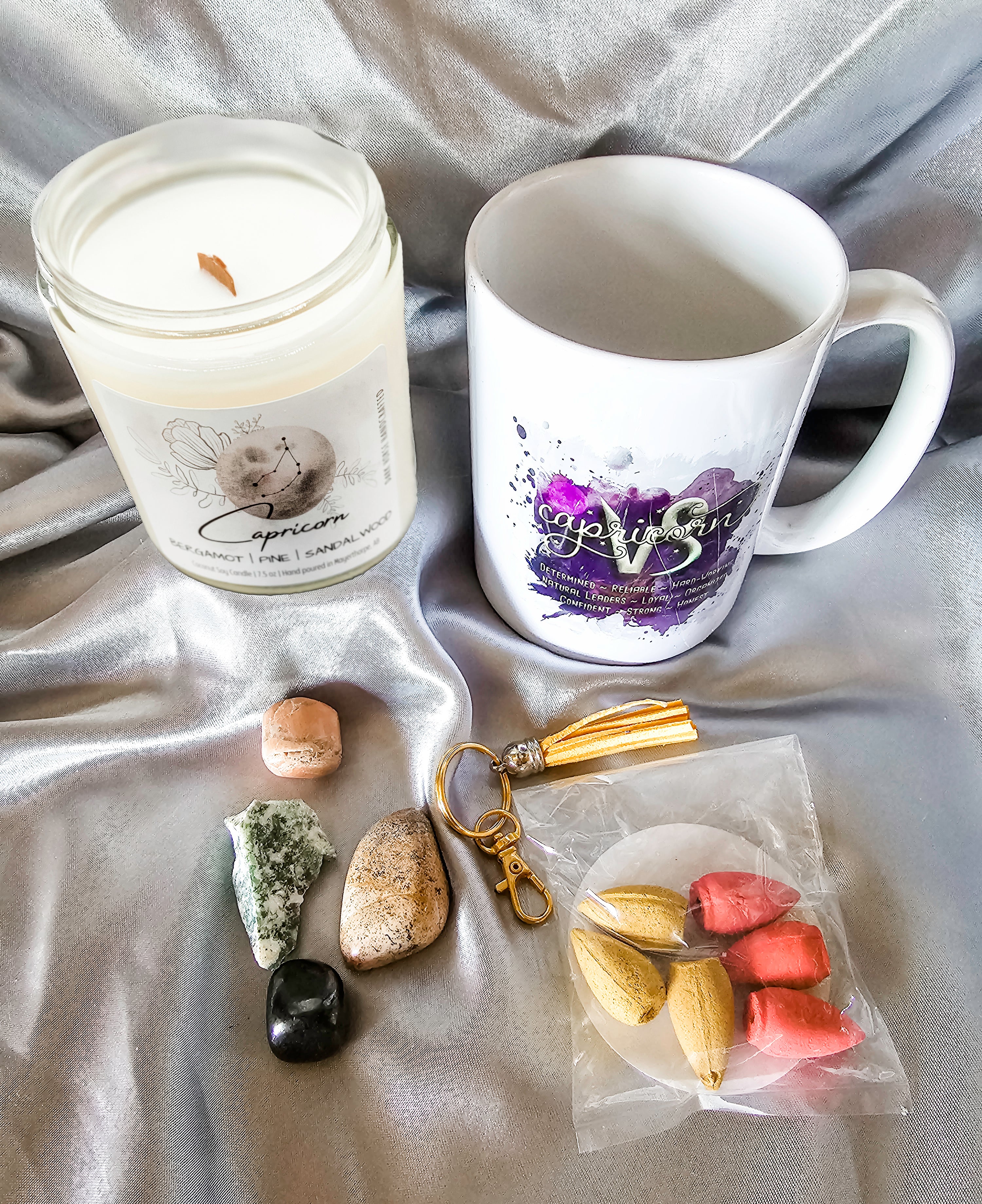 Capricorn zodiac candle gift box with mug, tumbled stones and incense cones.