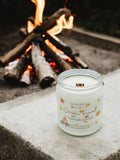 Crackling firewood fall candle in front of a bonfire