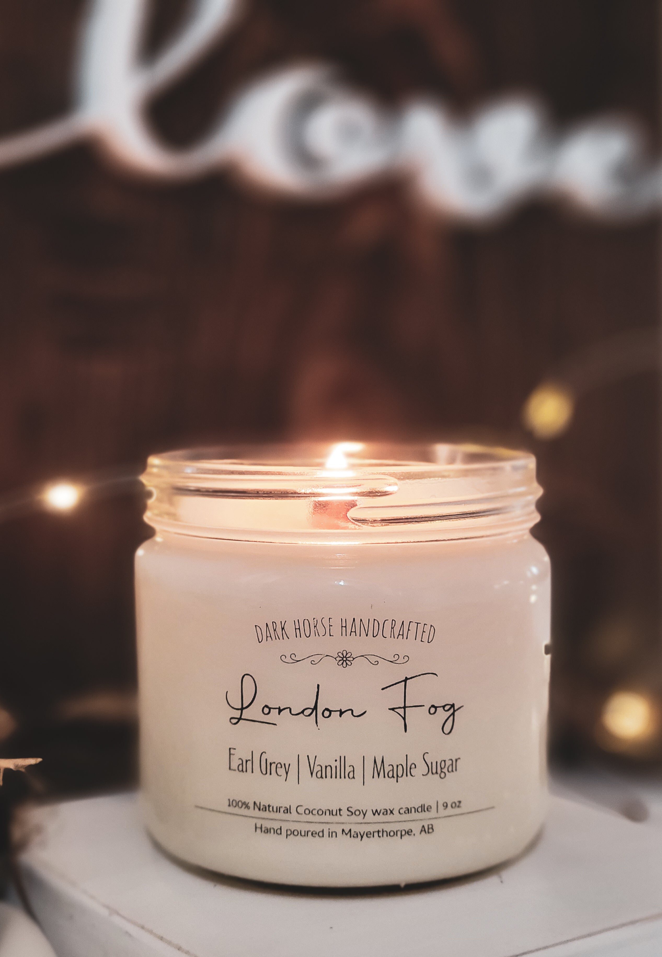 London Fog scented coconut soy candle with wood wick. Scent notes are Earl Grey, Vanilla & Maple Sugar