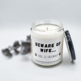 Beware of wife, dog is friendly, candle