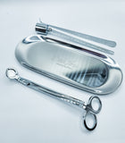 Silver candle accessory kit which includes tray, snuffer, wick dipper & wick trimmer.