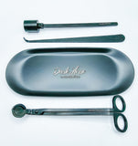 Matte black candle accessory kit which includes tray, snuffer, wick dipper & wick trimmer.