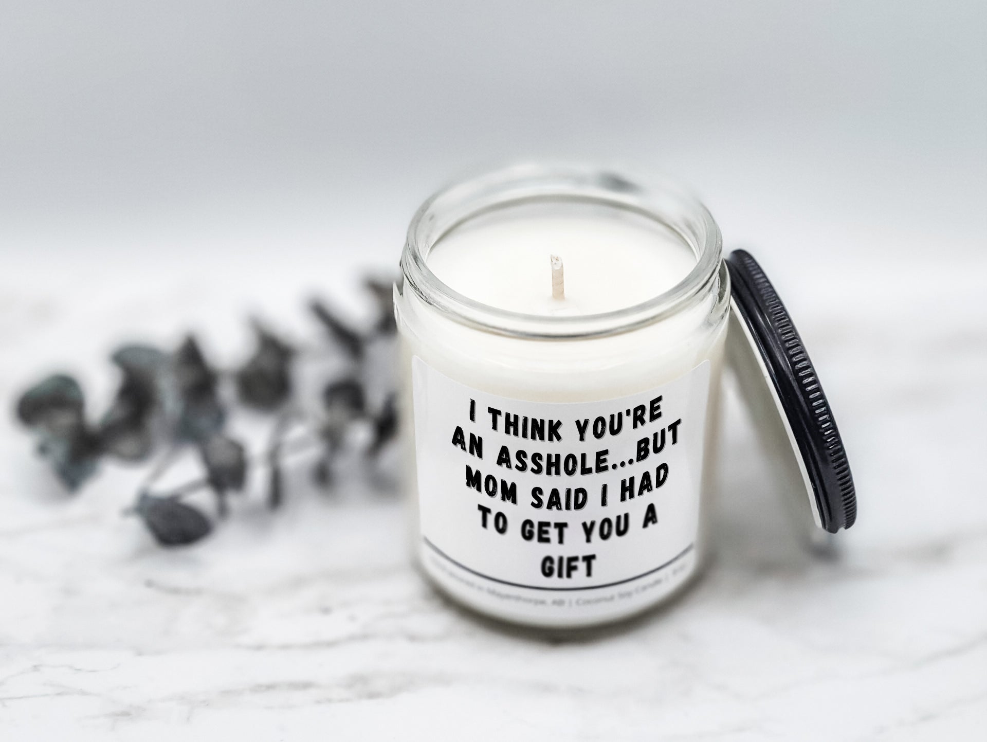 I think you're an asshole...but mom said I had to get you a gift candle
