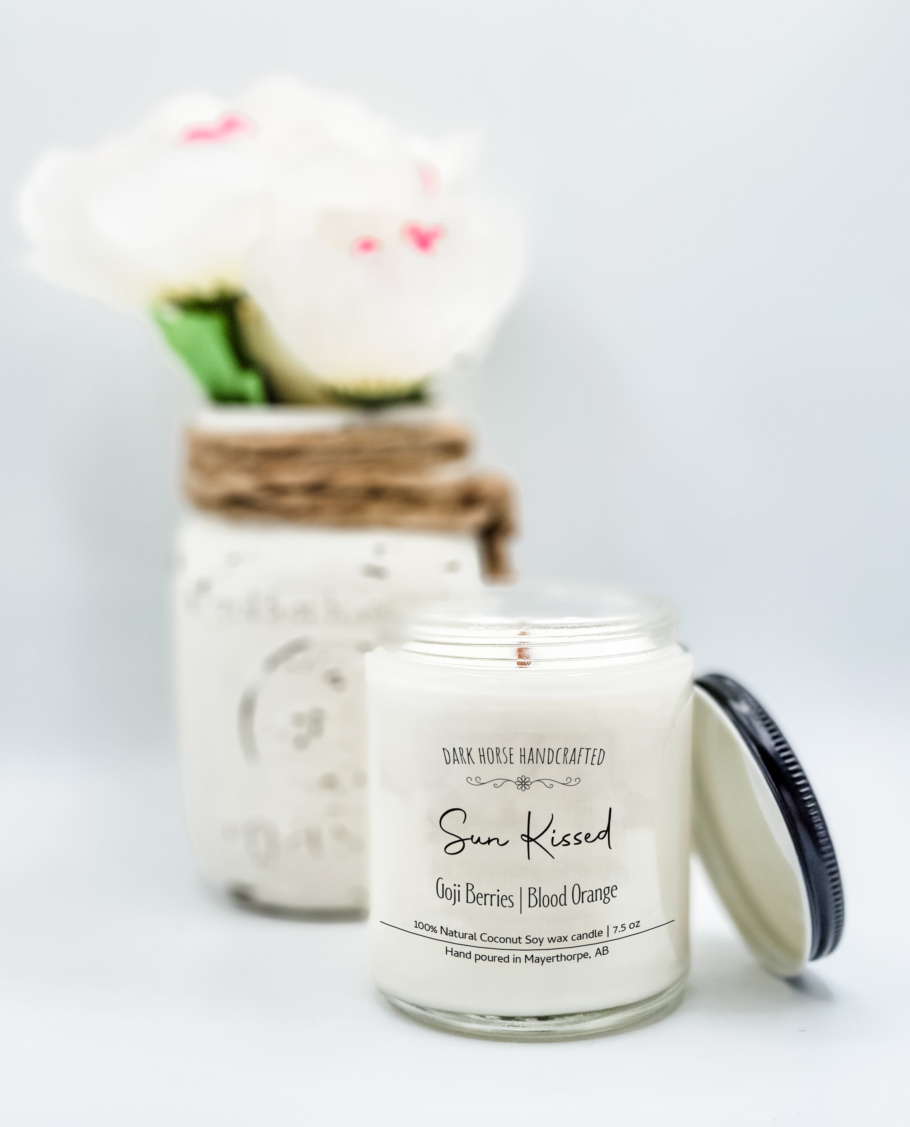 Sun Kissed scented coconut soy candle with wood wick. Scent notes are Goji Berries & Blood orange.